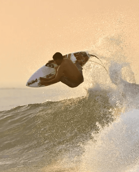 Allan Derecho coaching surfers at Cloud 9 in Siargao
