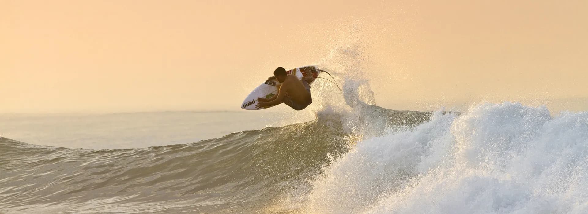 Allan Derecho coaching surfers at Cloud 9 in Siargao