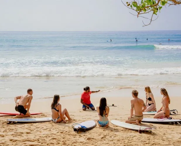 Surfer catching a wave at Siargao